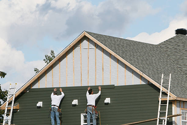 Professional Siding technician working in Wilson, PA